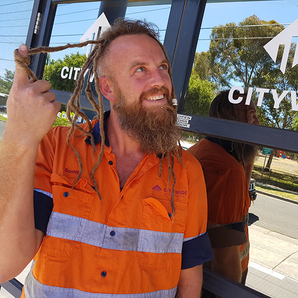 Citywide Scott Barnes Loses Dreadlocks For Charity